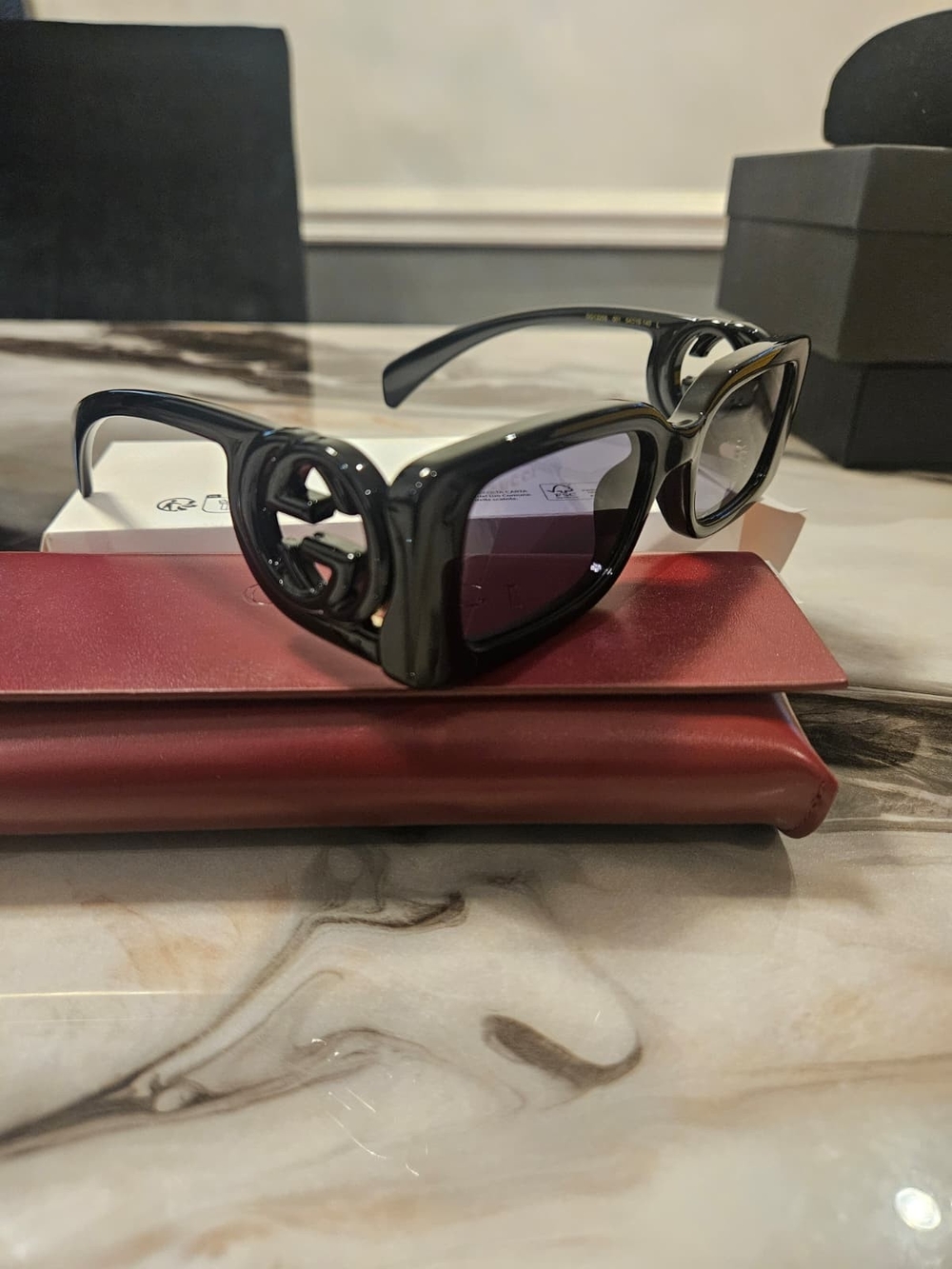 Gucci Black Cat-Eye Sunglasses with Cutout GG Temples